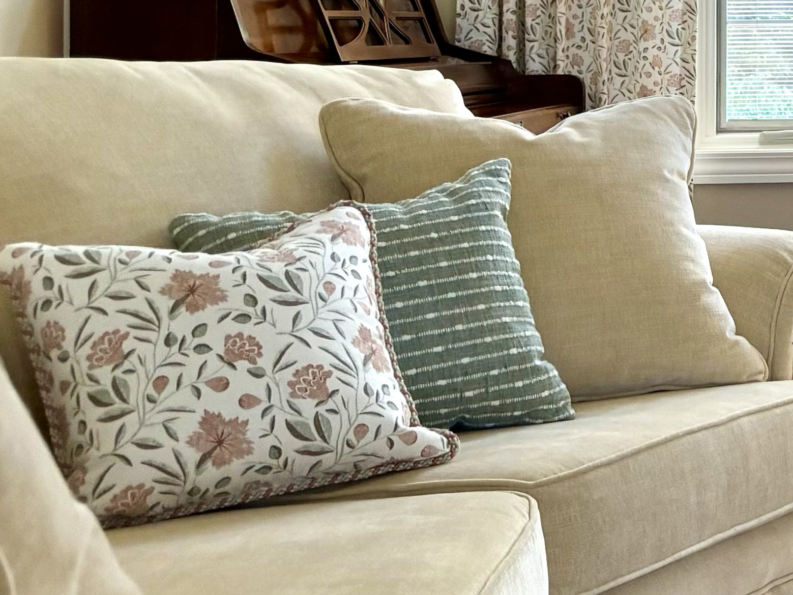 Cozy couch with custom pillows from Mr. K's Fabric Shop in Quincy, IL. Explore over 50 years of personalized upholstery solutions.