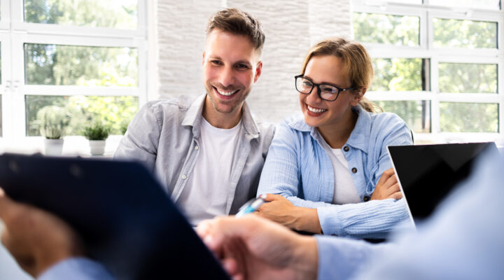Couple consulting with a professional | Mr. K's Fabric Shop in Quincy, IL, for custom window treatments and upholstery solutions.