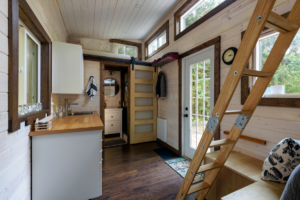 A rustic home interior with multiple window sizes