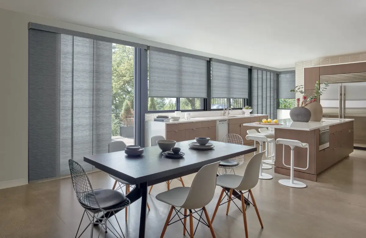 Skyline® Panel-Track Blinds on sliding glass doors in the dining area. 