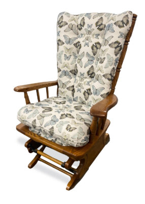 Rocking chair with butterfly fabric from Mr. K's Fabric Shop in Quincy, IL. Custom upholstery and 50+ years of expertise.