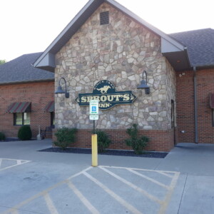 Mr. K's Fabric Shop vehicle outside Sprout’s Inn, Quincy, IL. Custom window treatments, upholstery, and awnings services.