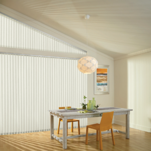 Bright dining area featuring custom window treatments from Mr. K's Fabric Shop, Quincy, IL, with 50+ years of experience.