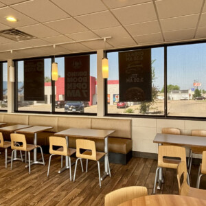 Interior of a restaurant featuring Mr. K's Fabric Shop window treatments in Quincy, IL, showcasing modern design and comfort.