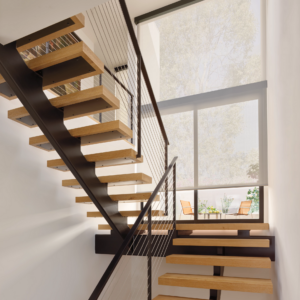 Stylish stairway leading to a bright space featuring custom window treatments by Mr. K's Fabric Shop, Quincy, IL.